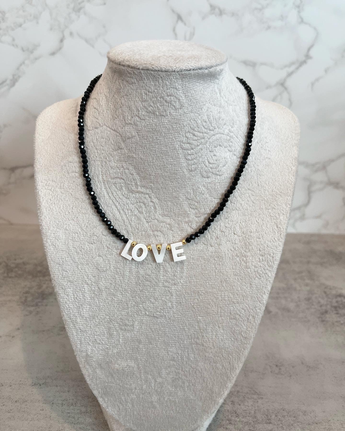 Black live necklace