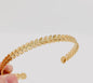 Feather bangle